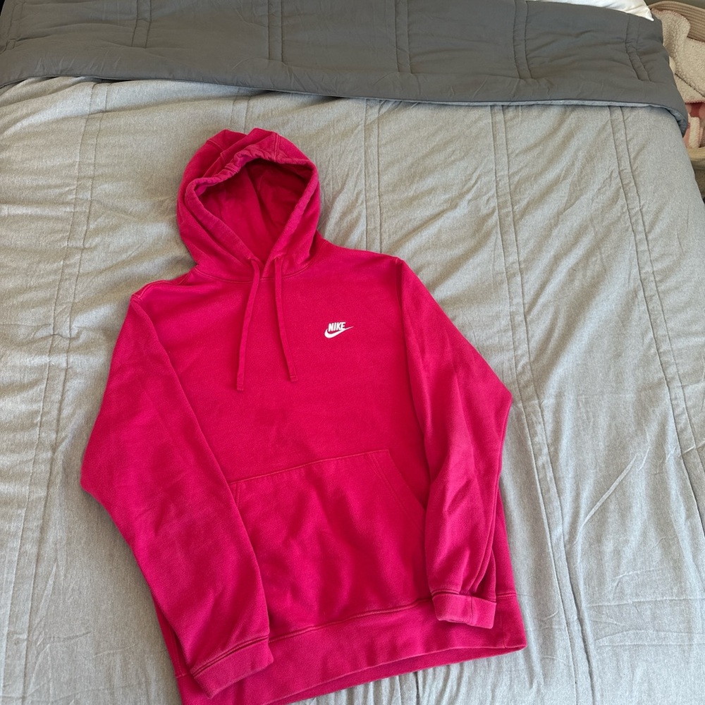 Hot pink 
Nike hoodie 
Size: Medium
